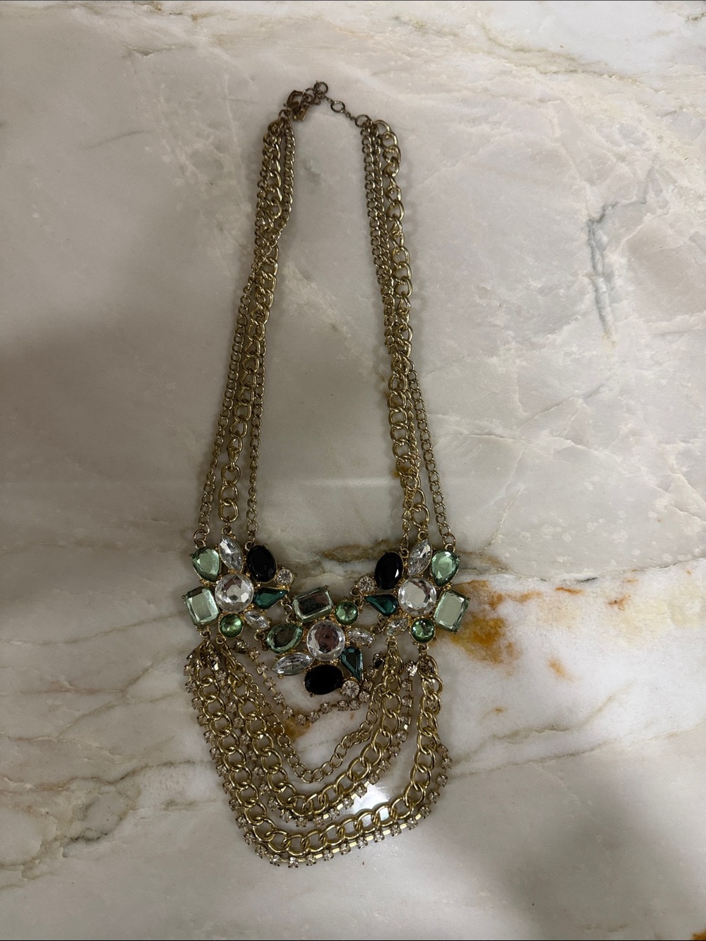 Gold Multi-Chain Statement Necklace with Green and Clear Stones